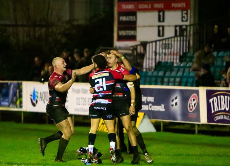 Congratulations for try-scorer Arthur Relton from Harry Yates (left) and Dan Hiscocks (number 21). Picture: Brian Tempest