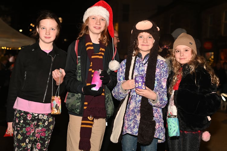 Pictured with their lanterns are Crystal, Phoenix, Angel and Nancy. (Picture: Adrian Jasper)