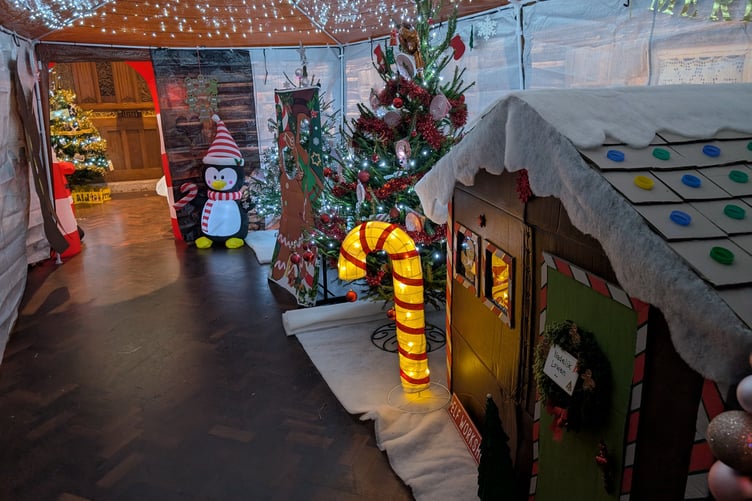 The entrance to the christmas tree festival takes visitors through a lovingly decorated grotto. (Picture: Aaron Greenaway)
