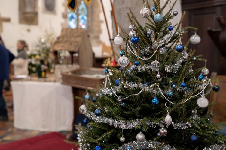 One of the many decorated trees inside the Church of St Peter and St Paul in Holsworthy (Picture: Aaron Greenaway)