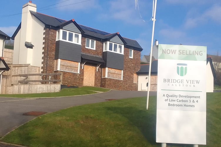 THE former Bridge View Nurseries site in Calstock, where 11 open market homes have stood empty since the developer went into receivership - before building any of the promised affordable housing