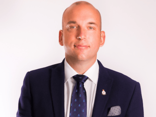 Former councillor breached code of conduct