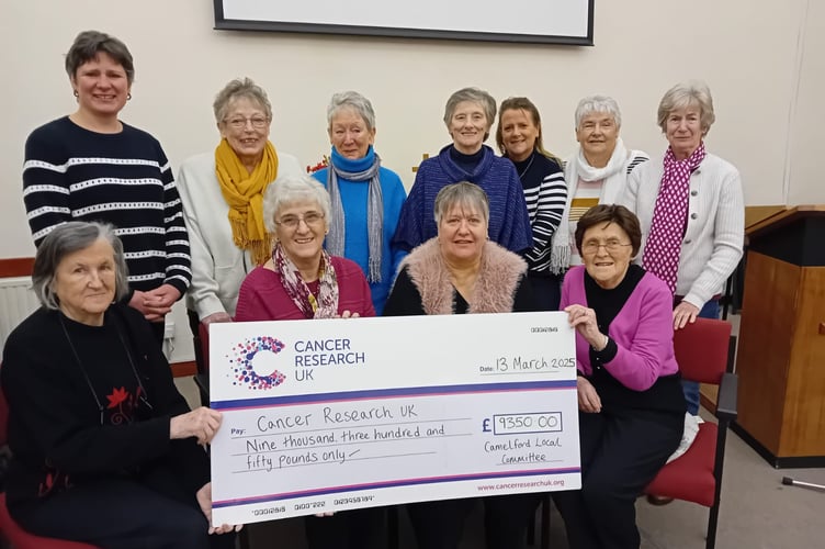 Members of the Camelford committee of Cancer Research UK (CRUK) presenting a cheque to Cancer Research UK. Back row; Jennifer Wood, Pam Lyons, Jan Stratfield, Lynn Oliver, Karina Lee-Edmunds, Enid Andrews and Judy Lamb. Front row; Honorary secretary Madge Walkey, chairman Ang Goodman, committee member Nicky Hill and treasurer Sally Moore