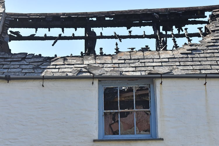 The roof of the property in Boscastle was significantly destroyed by fire (Picture: Adrian Jasper) 