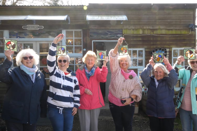 Some of the participants with their stained glass creations. (Picture: Friends of Lanteglos Church)