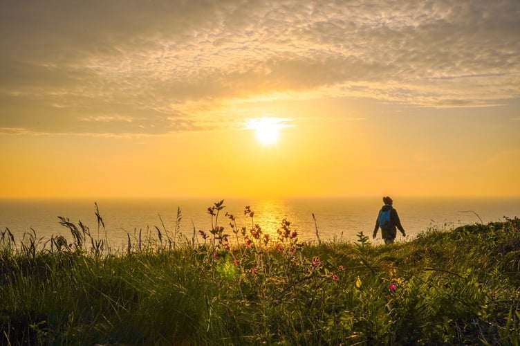 Walking on Sunshine, Tintagel, Cornwall -taken by Jasmin Fernholz, the South West Coast Path Photographer of the Year 2024