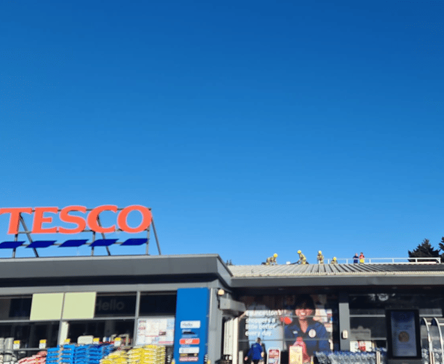 Emergency services called after supermarket roof damaged by winds