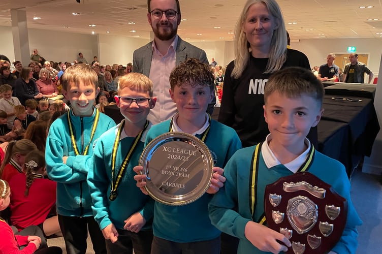 The winning Year 5/6 Boys team from Carbeile School celebrate their achievements