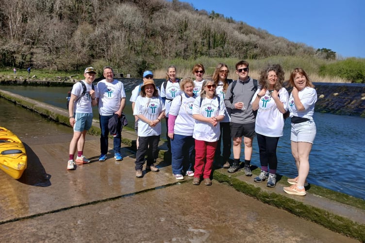 The team wait for the right tidal conditions at Lopwell Dam to continue their walk along the Tamara route to Derriford. (Picture: Kay Barriball)