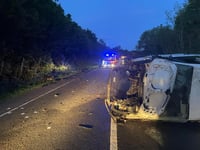 Driver flees scene after overturning van 