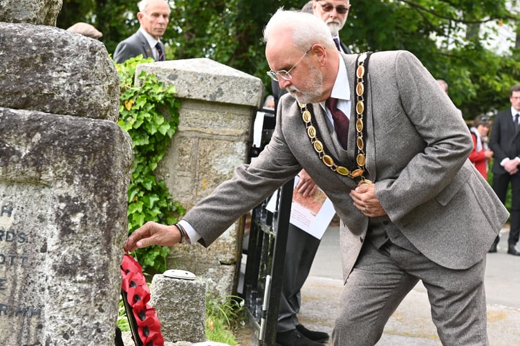 Rob Rotchell, mayor of Camelford, lays the wreath on behalf of Camelford Town Council at Lanteglos (Picture: Adrian Jasper)