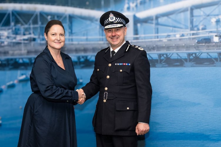 Alison Hernandez with interim police chief James Vaughan