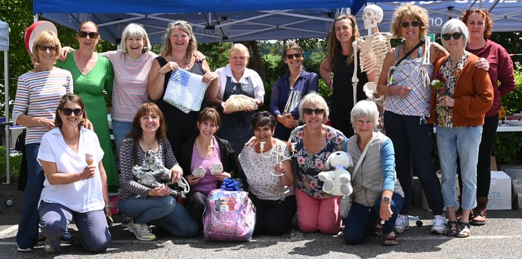 The team of the Stratton Hospital League of Friends and staff members ready with a warm welcome at their annual summer fete