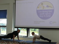 Students join IT technician for charity push up challenge 