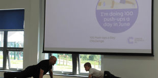 Students join IT technician for charity push up challenge 
