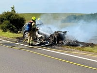 Vehicle and hay bales destroyed