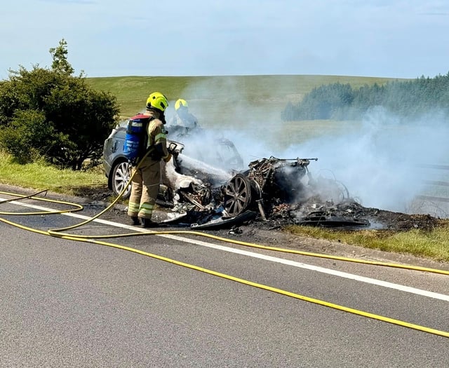 Vehicle and hay bales destroyed