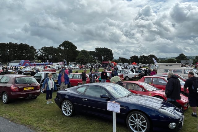 Thousands brave the rain to attend popular car show