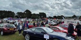 Thousands brave the rain to attend popular car show