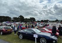Thousands brave the rain to attend popular car show