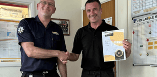 Celebrations for Cornwall firefighter after long service milestone