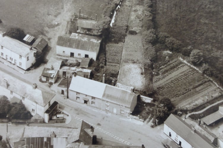 The Post is grateful to Rose Hitchings of Bridgerule for supplying this unusual aerial shot of her village. She said: "Showing the village pub - The Bridge Inn lower right. On the side of the white cottages - left - is a tiny mark that was the village pump where most in the village got their water supply from. Fields long gone - and the days when people grew crops in their gardens. Centre is the Blacksmith's cottage and next to it (left) Primrose Cottage. The village shop is also in the photo."