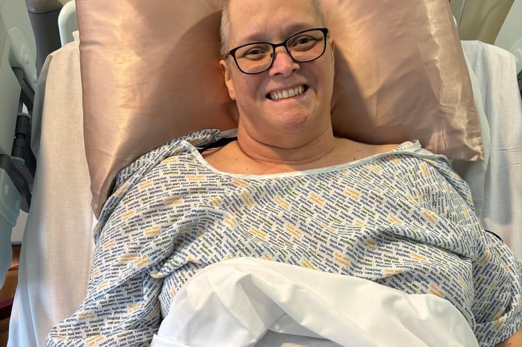 Karen Davey in hospital. A woman has been left unable to walk after her cancer symptoms were mistaken for menopause symptoms.Karen Davey, 54, started experiencing fatigue, hot flushes, and loss of appetite - leading her to believe she was experiencing symptoms of menopause. After being hospitalised for two weeks, she was diagnosed with stage four non-Hodgkin lymphoma in her kidneys - with a tumour wrapped around her spinal cord.Due to the spinal cord injury it caused, Karen cannot walk and is now a full-time wheelchair user.
