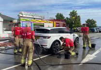 Fire fighters' car wash raises £700 for charity