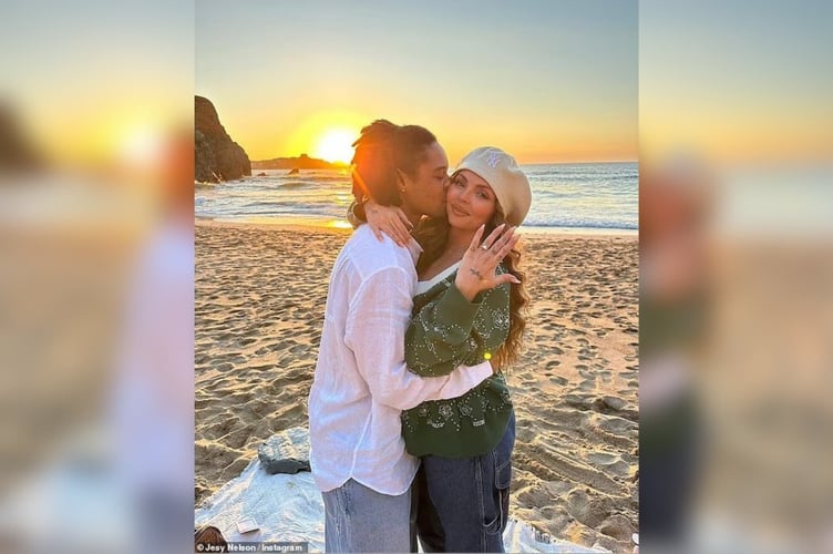 Jesy Nelson showed off her ring at Lusty Glaze Beach after a romantic sunset proposal from boyfriend Zion Foster (Picture: Jesy Nelson/Instagram)