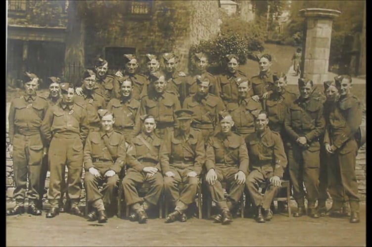 Barrie says of this photograph: “Here is the Bodmin Home Guard taken outside the church by the entrance steps in 1944.”