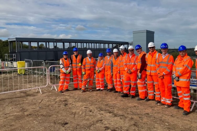 Guests gathered on visit to Okehampton Interchange site.