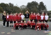Students wowed after visit from inspirational local swimmer