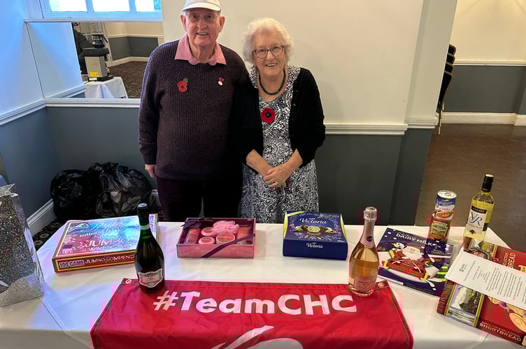 Ken and Joy with the raffle at the Devon and Cornwall Foresters area quiz