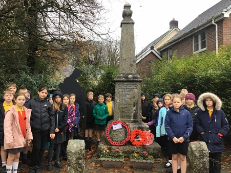 Class four observing their respects at the war memorial. (Picture: Halwill and Ashwater Schools)