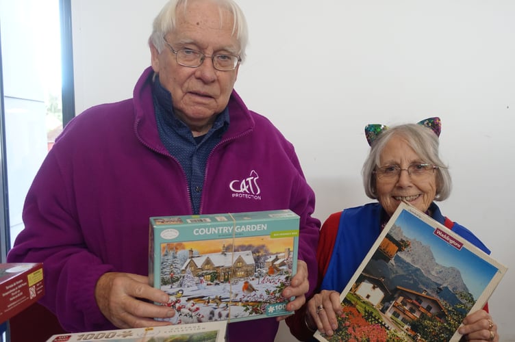 Hoping to tempt you with many of the Jigsaw Puzzles on offer are Richard and Joyce                             