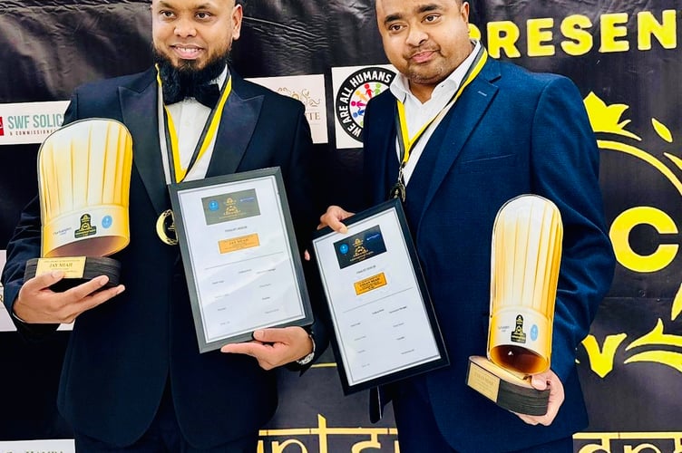 (L-R) Jay and Mo Miah with their awards