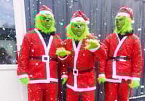 Town turns red as a sea of Santas run for charity