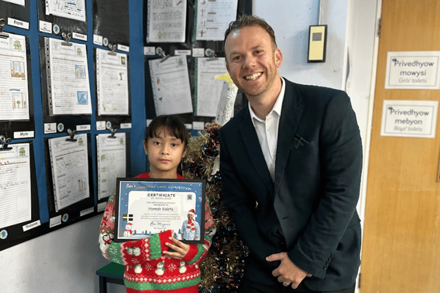 MP presents Christmas card prize to competition winner