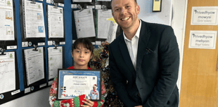 MP presents Christmas card prize to competition winner