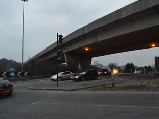 Man dies after fall from flyover onto A38