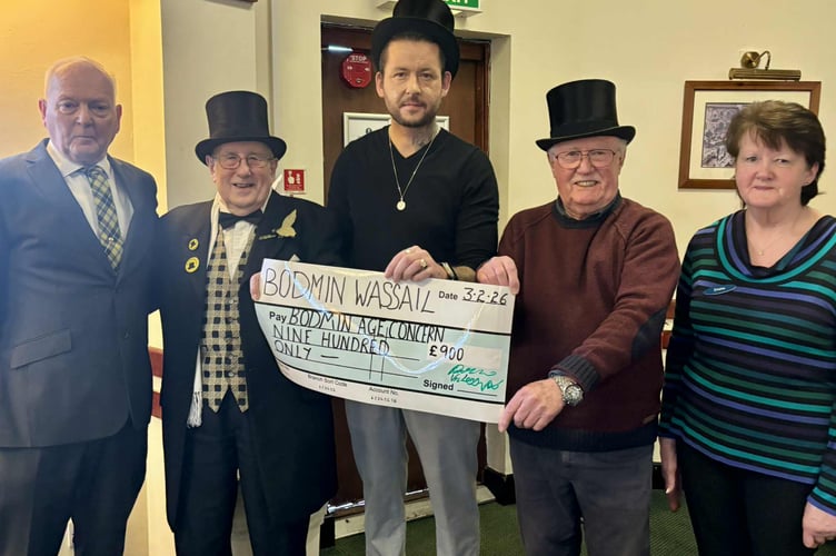 Members of the Bodmin Wassail pictured with representatives of Bodmin Age Concern, including Cllr Mike Barbery (left) (Picture: Bodmin Town Council)