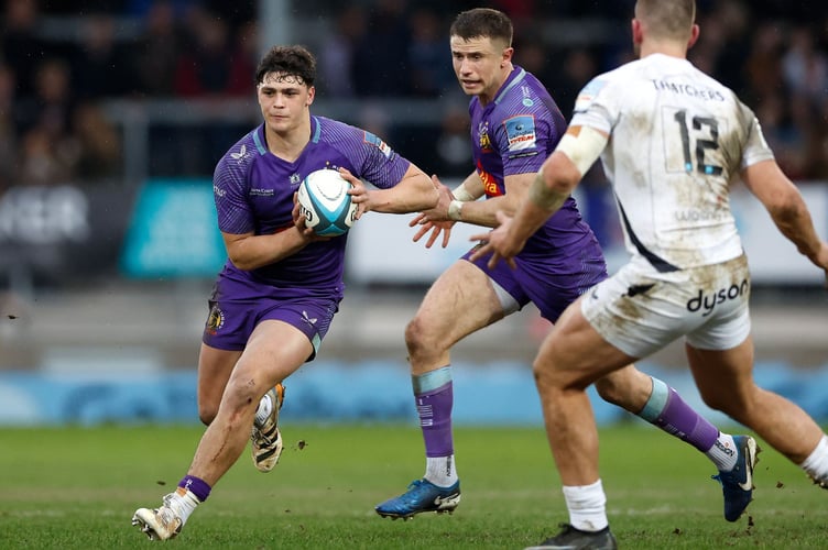 Exeter Chiefs centre Ollie Batson looks to find a way round Bath's Will Butt during their Premiership Rugby Cup clash