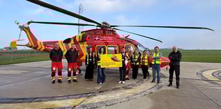 Staff mark over 10 years of backing for air ambulance