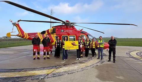 Staff mark over 10 years of backing for air ambulance