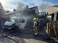 Fire crews battle two vehicle blaze in Cardinham 