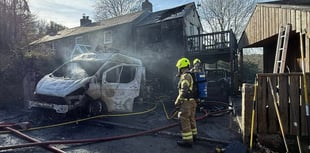 Fire crews battle two vehicle blaze in Cardinham 