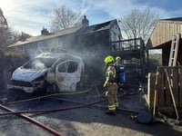 Fire crews battle two vehicle blaze in Cardinham 
