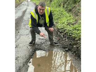 Calls for residents to help report potholes