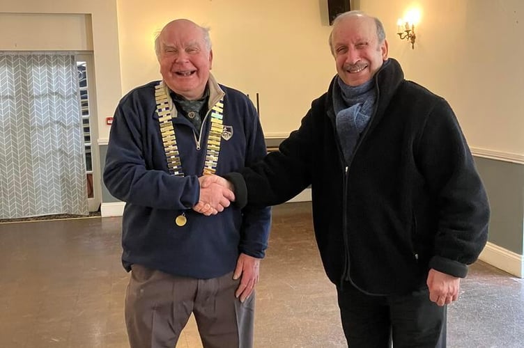 Launceston Probus chairman Jim Watling welcoming new member Mohammed