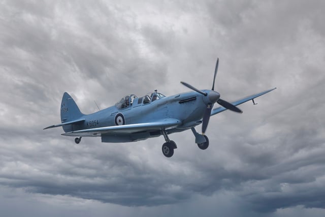 Crowds marvel as iconic Spitfire flies over the skies of Cornwall